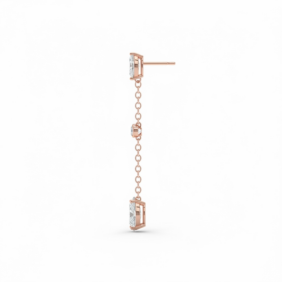 Rose gold earring with chain and clear gemstones on a white background