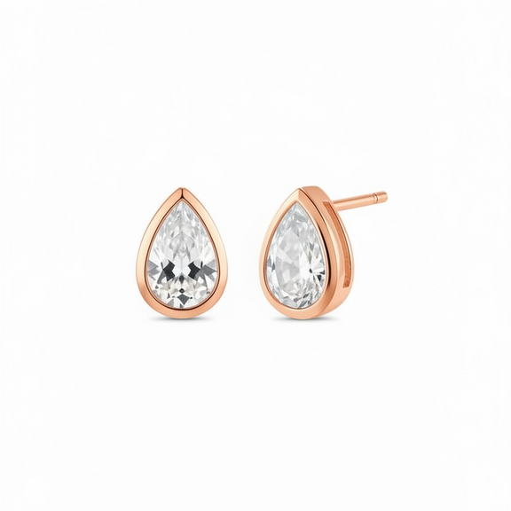Rose gold teardrop earrings with clear diamond on a white background
